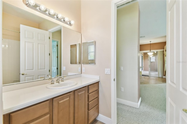 521 Milano Rd, Kissimmee, FL 34759 - bathroom featuring vanity and baseboards