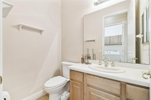 521 Milano Rd, Kissimmee, FL 34759 - half bathroom featuring washer / clothes dryer and vanity