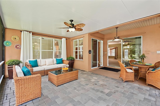 521 Milano Rd, Kissimmee, FL 34759 - sunroom / solarium featuring ceiling fan, an outdoor living space, and outdoor dining space
