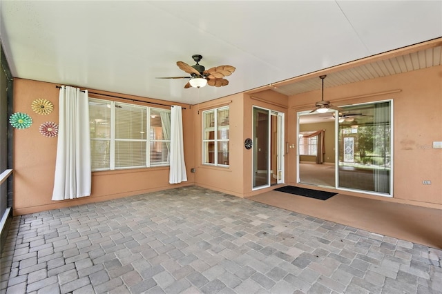 521 Milano Rd, Kissimmee, FL 34759 - unfurnished sunroom featuring ceiling fan