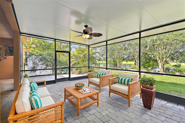 521 Milano Rd, Kissimmee, FL 34759 - sunroom / solarium featuring an outdoor hangout area and ceiling fan