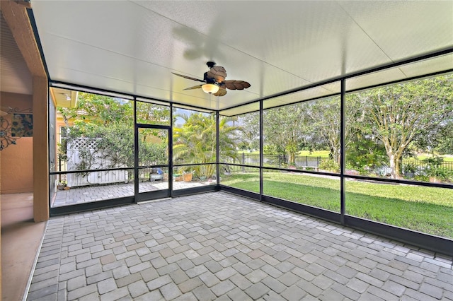 521 Milano Rd, Kissimmee, FL 34759 - unfurnished sunroom featuring ceiling fan
