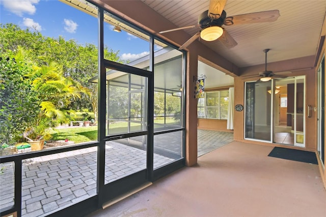 521 Milano Rd, Kissimmee, FL 34759 - unfurnished sunroom featuring a ceiling fan and plenty of natural light