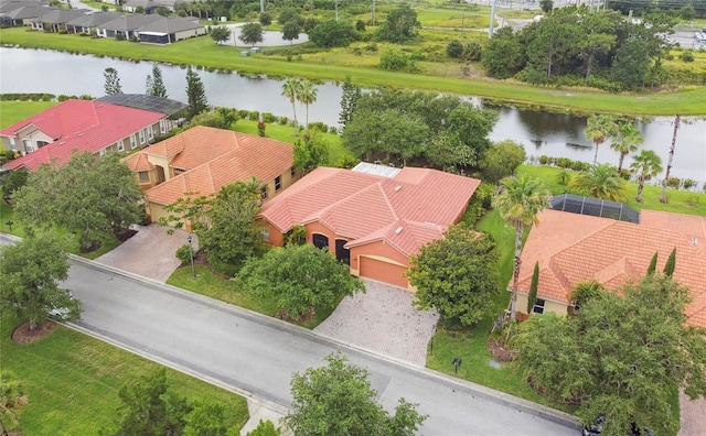 521 Milano Rd, Kissimmee, FL 34759 - aerial view of residential area featuring a large body of water