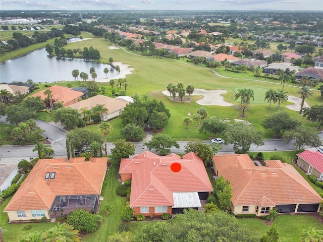 521 Milano Rd, Kissimmee, FL 34759 - aerial view of residential area with a golf course and a large body of water