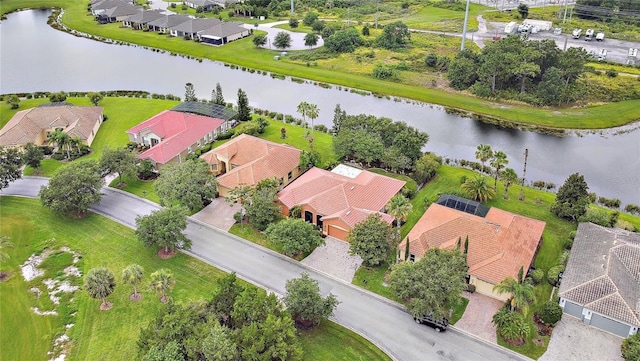 521 Milano Rd, Kissimmee, FL 34759 - aerial view of residential area featuring a nearby body of water