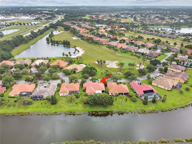 521 Milano Rd, Kissimmee, FL 34759 - aerial overview of property's location with nearby suburban area and a nearby body of water