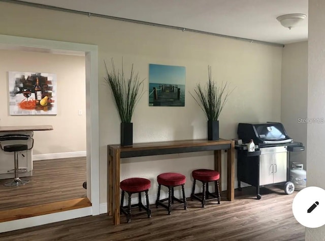 2940 Lake Margaret Dr, Orlando, FL 32806 - bar with wood finished floors and baseboards
