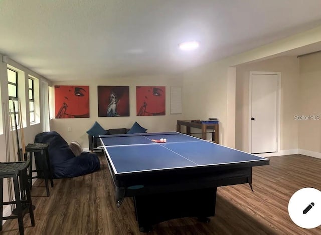 2940 Lake Margaret Dr, Orlando, FL 32806 - playroom with dark wood-style flooring