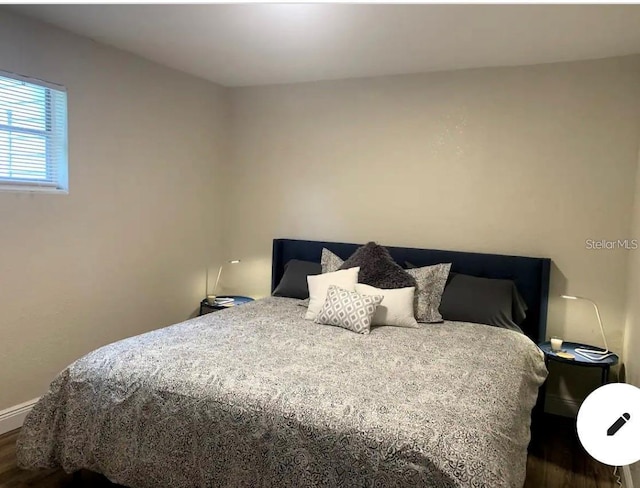 2940 Lake Margaret Dr, Orlando, FL 32806 - bedroom with wood finished floors and baseboards