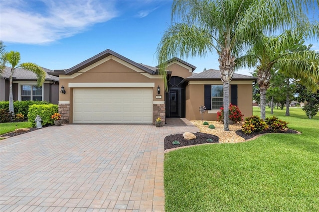 802 Soria Ln, Davenport, FL 33837 - ranch-style house with stucco siding, decorative driveway, a garage, and a front yard