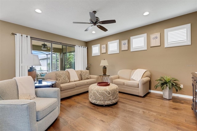 802 Soria Ln, Davenport, FL 33837 - living room featuring ceiling fan, light wood-style flooring, and recessed lighting