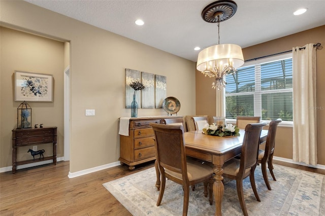 802 Soria Ln, Davenport, FL 33837 - dining area with light wood-style floors, recessed lighting, and a chandelier