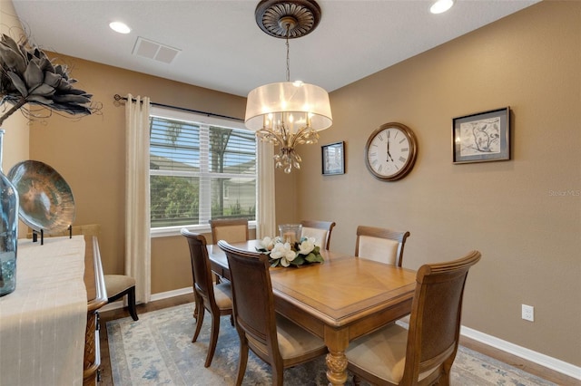 802 Soria Ln, Davenport, FL 33837 - dining space featuring a chandelier, recessed lighting, and light wood-style flooring