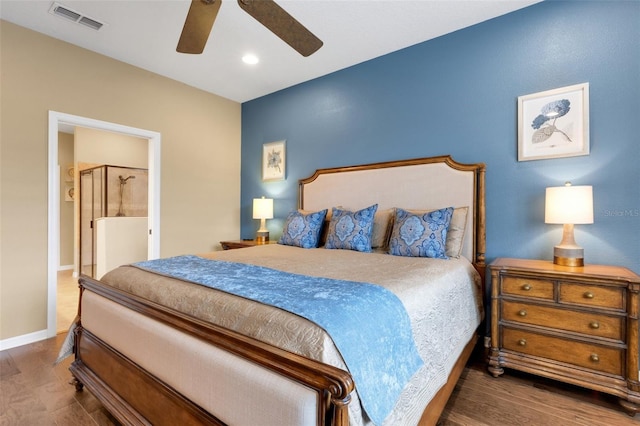 802 Soria Ln, Davenport, FL 33837 - bedroom with wood finished floors, a ceiling fan, and ensuite bath