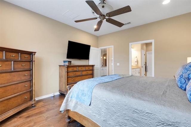 802 Soria Ln, Davenport, FL 33837 - bedroom featuring wood-type flooring, ensuite bath, recessed lighting, and a ceiling fan