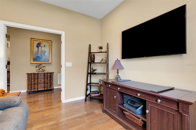 802 Soria Ln, Davenport, FL 33837 - living room featuring light wood finished floors and baseboards