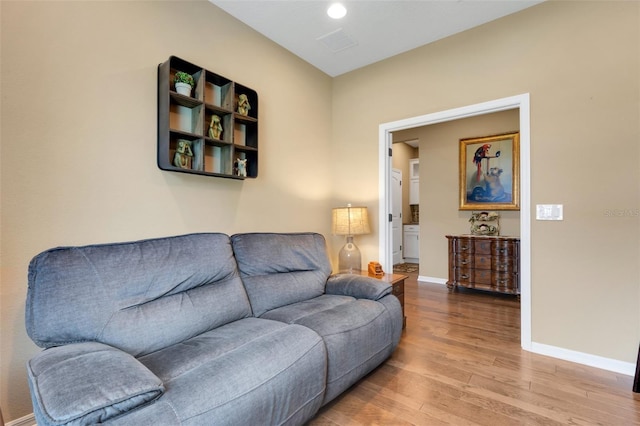 802 Soria Ln, Davenport, FL 33837 - living area featuring wood finished floors and baseboards