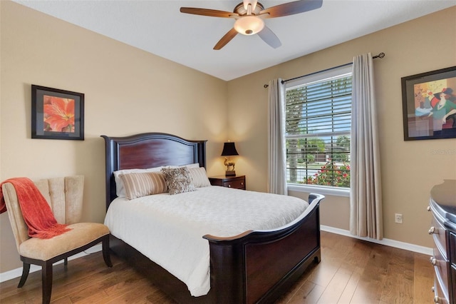 802 Soria Ln, Davenport, FL 33837 - bedroom featuring wood finished floors and a ceiling fan