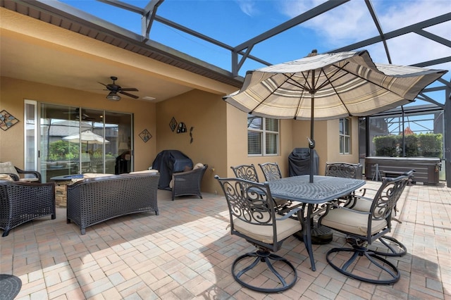802 Soria Ln, Davenport, FL 33837 - view of patio featuring a hot tub, a lanai, ceiling fan, and outdoor lounge area