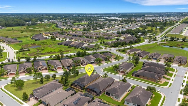 802 Soria Ln, Davenport, FL 33837 - aerial view of property's location featuring nearby suburban area, a large body of water, and a golf course
