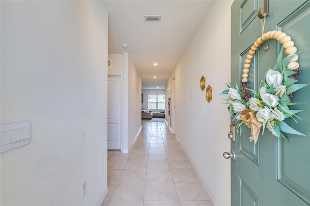 320 Boardwalk Ave, Haines City, FL 33844 - hallway featuring light tile patterned flooring and recessed lighting