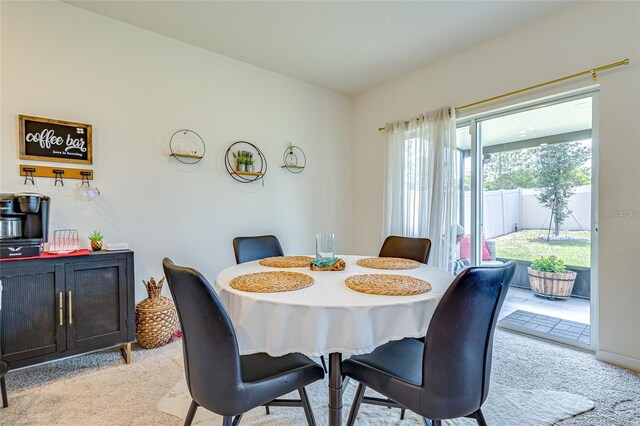320 Boardwalk Ave, Haines City, FL 33844 - dining area with light colored carpet