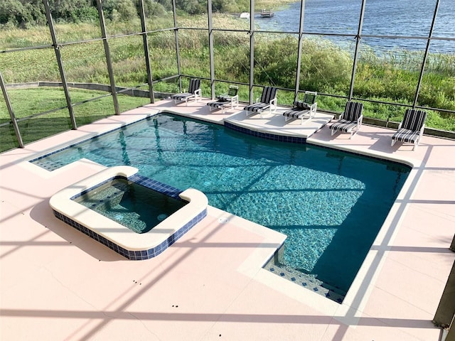 352 Cherokee Ave, Haines City, FL 33844 - view of swimming pool featuring a patio, glass enclosure, a pool with connected hot tub, and a water view