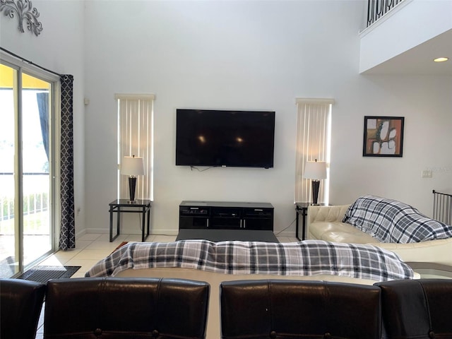352 Cherokee Ave, Haines City, FL 33844 - tiled living area featuring a high ceiling
