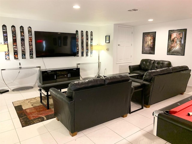 352 Cherokee Ave, Haines City, FL 33844 - living area with tile patterned floors and recessed lighting