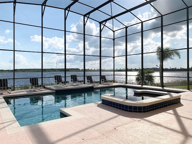 352 Cherokee Ave, Haines City, FL 33844 - view of pool featuring a patio, a pool with connected hot tub, and a water view