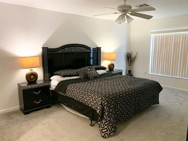 352 Cherokee Ave, Haines City, FL 33844 - carpeted bedroom with ceiling fan and baseboards