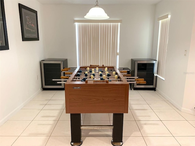 352 Cherokee Ave, Haines City, FL 33844 - game room with wine cooler and light tile patterned floors