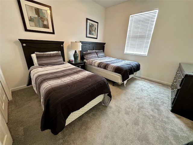 352 Cherokee Ave, Haines City, FL 33844 - bedroom with light colored carpet and baseboards