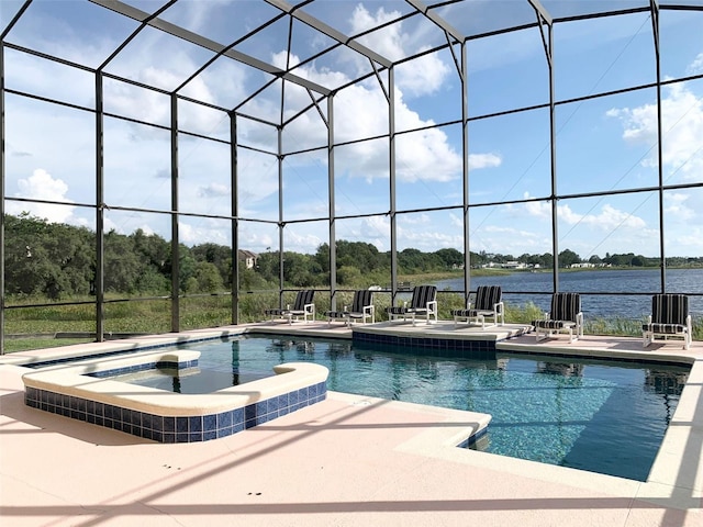 352 Cherokee Ave, Haines City, FL 33844 - view of swimming pool with a patio area, a pool with connected hot tub, and a water view
