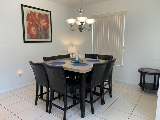 352 Cherokee Ave, Haines City, FL 33844 - dining room featuring a chandelier and light tile patterned flooring