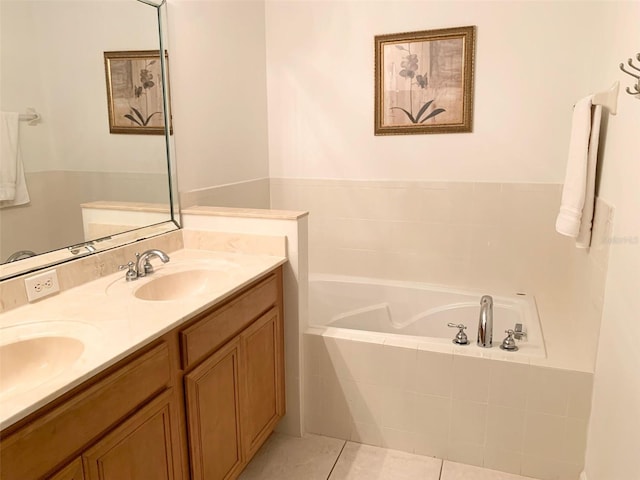 352 Cherokee Ave, Haines City, FL 33844 - bathroom featuring a garden tub, tile patterned floors, and double vanity