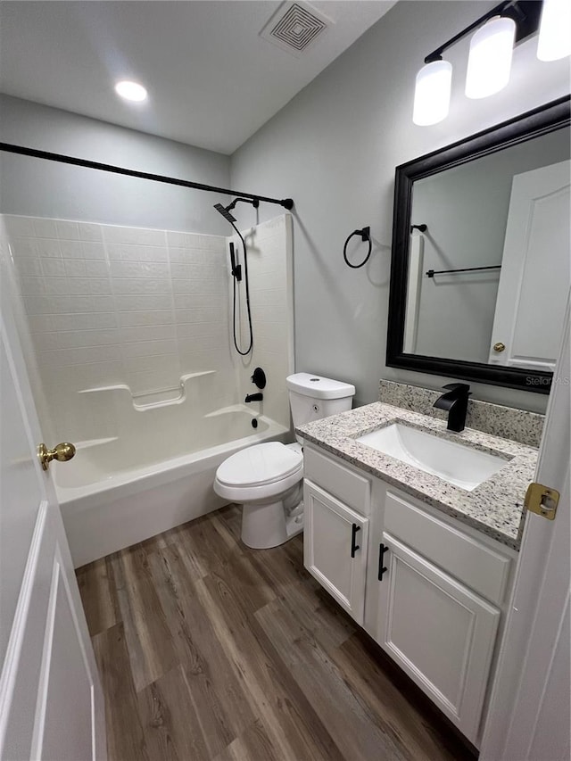2211 Julianna Ct, Saint Cloud, FL 34769 - full bath featuring vanity, bathing tub / shower combination, and wood finished floors