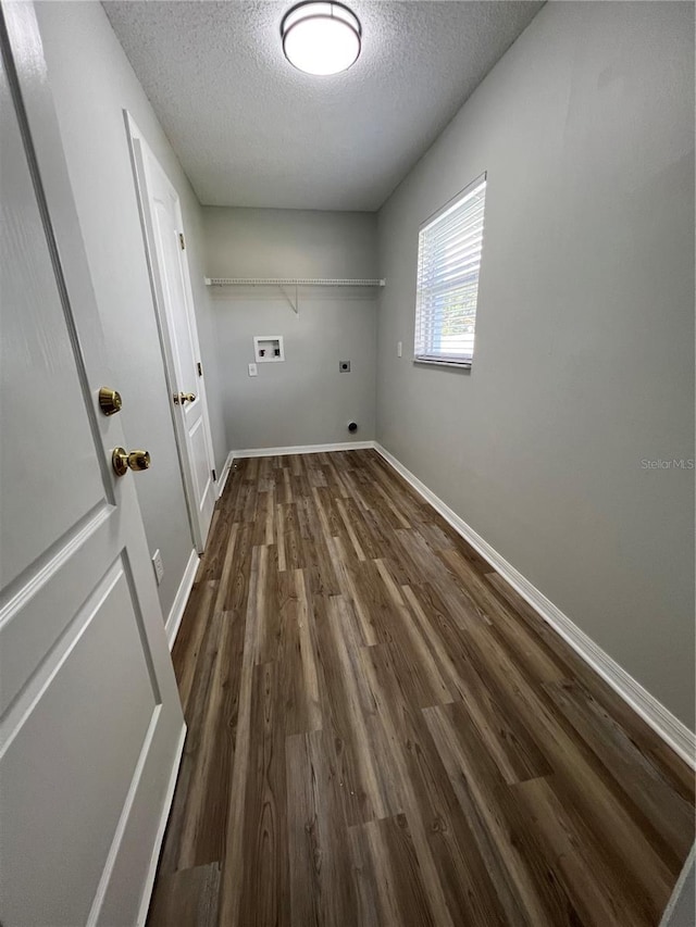 2211 Julianna Ct, Saint Cloud, FL 34769 - laundry area with hookup for an electric dryer, a textured ceiling, hookup for a washing machine, and dark wood finished floors
