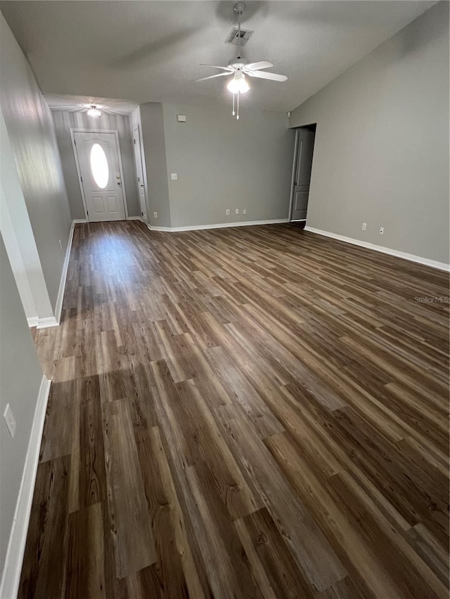 2211 Julianna Ct, Saint Cloud, FL 34769 - unfurnished living room with dark wood-type flooring and a ceiling fan