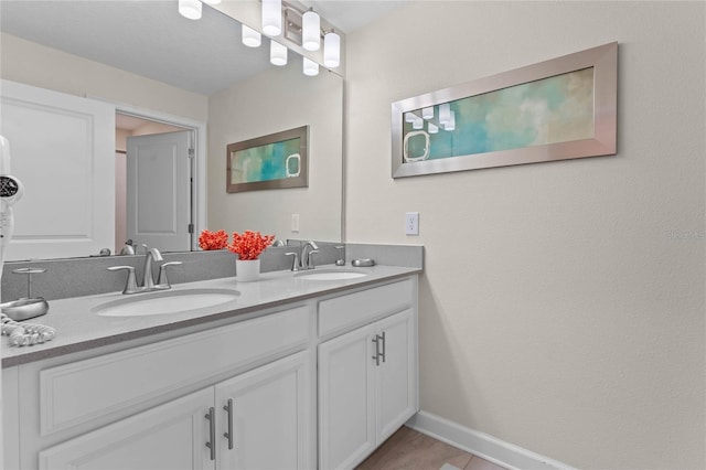 4840 Romeo Cir, Kissimmee, FL 34746 - full bath with double vanity and tile patterned floors