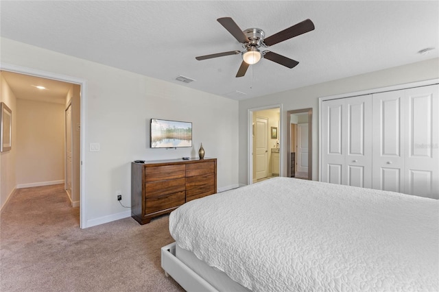 4840 Romeo Cir, Kissimmee, FL 34746 - bedroom with carpet floors, a closet, ceiling fan, and ensuite bath