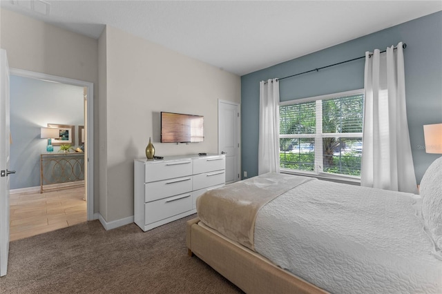 4840 Romeo Cir, Kissimmee, FL 34746 - bedroom with carpet flooring and baseboards