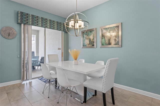 4840 Romeo Cir, Kissimmee, FL 34746 - dining room featuring a chandelier and baseboards