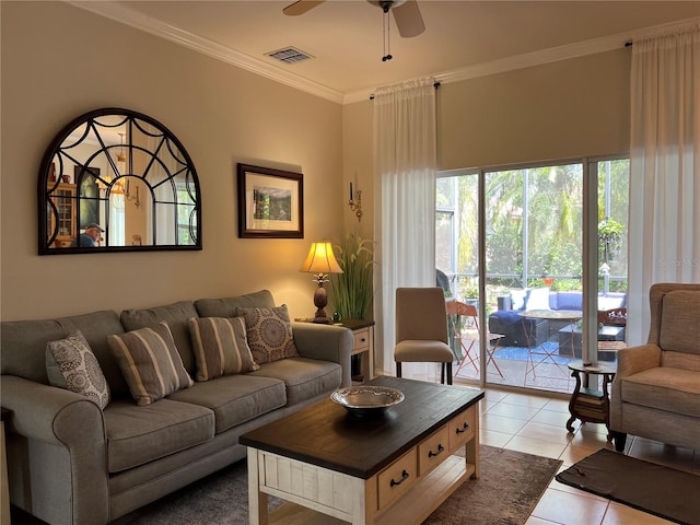 99 Auburn Dr, Kissimmee, FL 34759 - living room featuring ceiling fan, light tile patterned floors, and ornamental molding