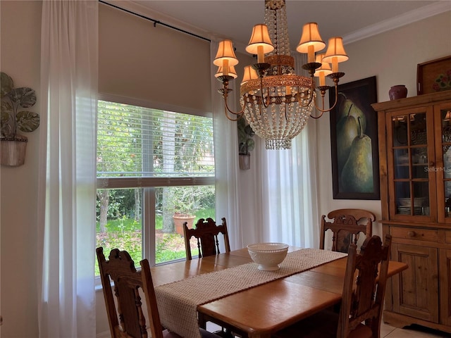 99 Auburn Dr, Kissimmee, FL 34759 - dining area with a chandelier and crown molding