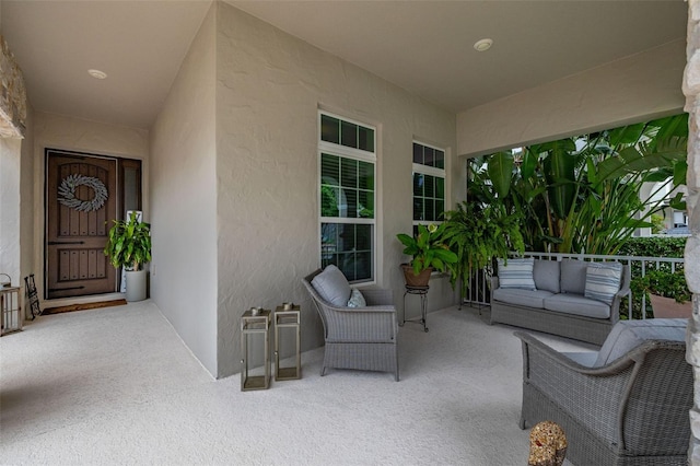 14728 Scott Key Dr, Winter Garden, FL 34787 - doorway to property featuring stucco siding and an outdoor living space