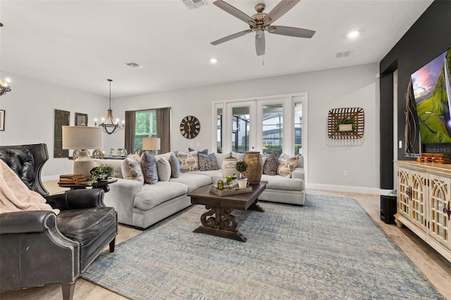 14728 Scott Key Dr, Winter Garden, FL 34787 - living area with a chandelier, a ceiling fan, recessed lighting, and wood finished floors