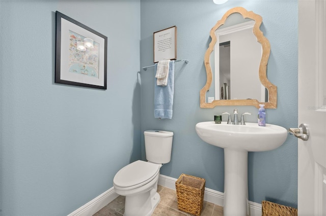 14728 Scott Key Dr, Winter Garden, FL 34787 - half bathroom featuring toilet and tile patterned flooring