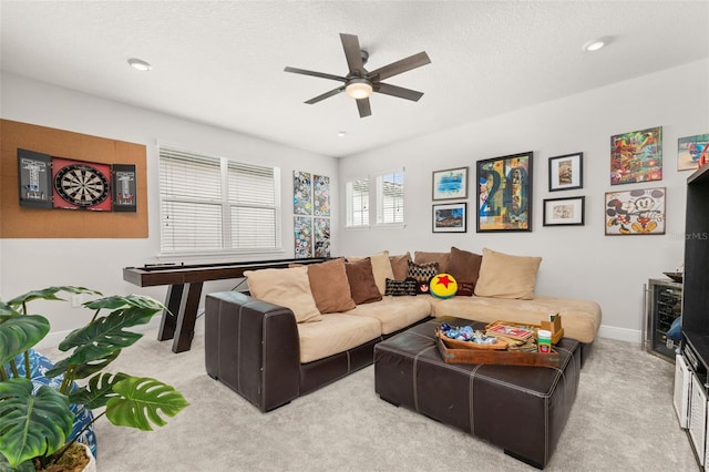 14728 Scott Key Dr, Winter Garden, FL 34787 - carpeted living area with ceiling fan, recessed lighting, and a textured ceiling